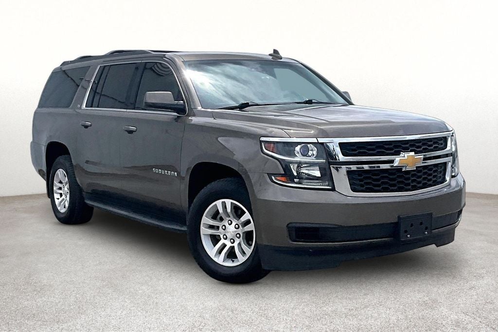 2016 Chevrolet Suburban LS in Brownstone Metallic — front three-quarter view