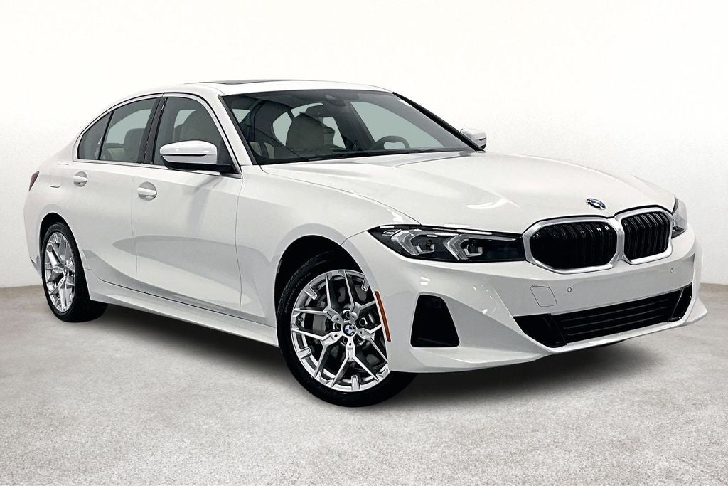 2026 BMW 3 Series 330i in Alpine White — front three-quarter view
