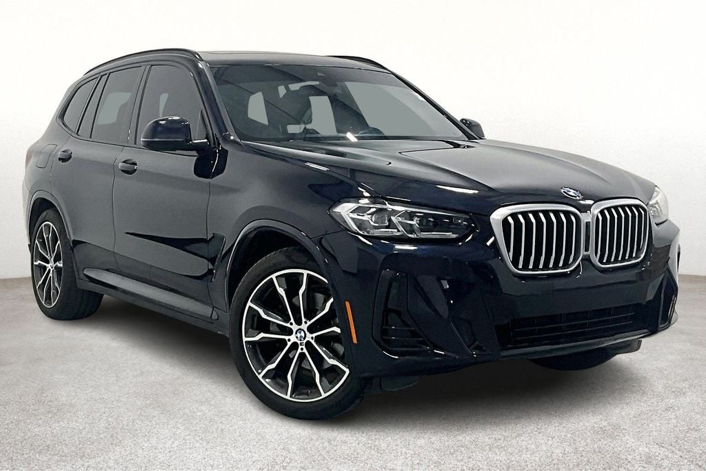 2023 BMW X3 sDrive30i in Carbon Black Metallic — front three-quarter view