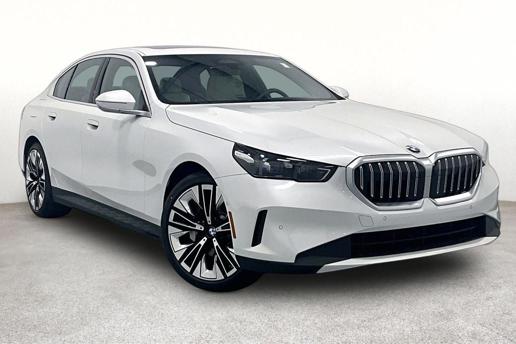 2027 BMW 5 Series 530i in Mineral White Metallic — front three-quarter view