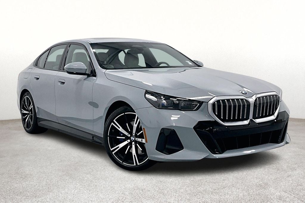 2026 BMW 5 Series 530i in Brooklyn Grey Metallic — front three-quarter view