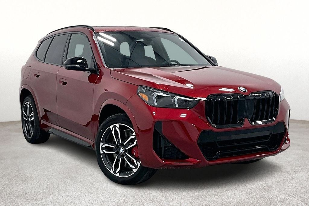 2026 BMW X1 xDrive28i in Vegas Red Metallic — front three-quarter view