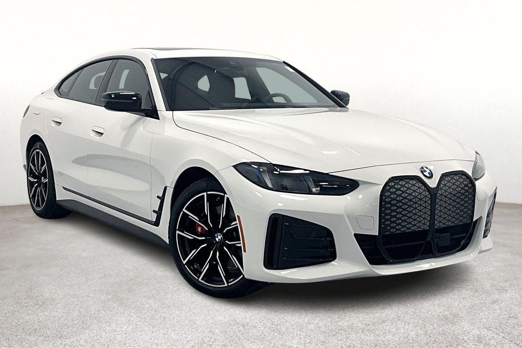 2026 BMW i4 eDrive40 in Alpine White — front three-quarter view