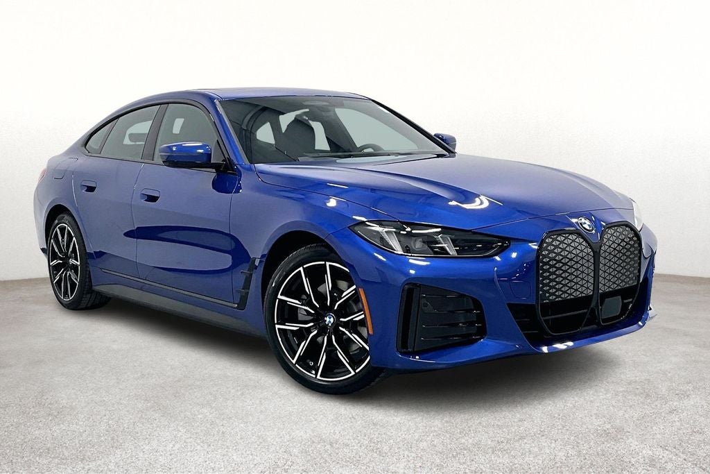 2026 BMW i4 eDrive40 in Portimao Blue Metallic — front three-quarter view