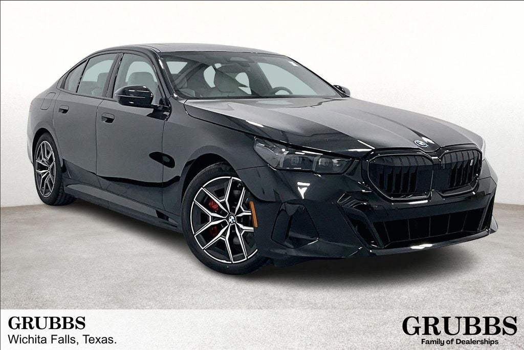 2026 BMW i5 eDrive40 in Black Sapphire Metallic — front three-quarter view