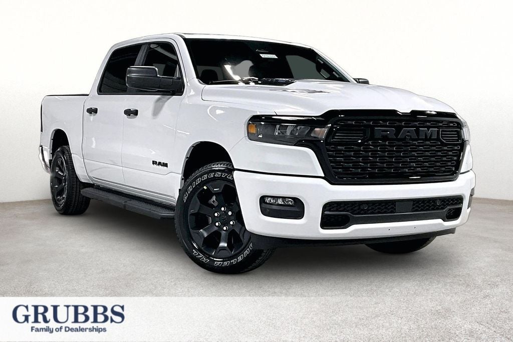 2026 RAM Ram 1500 RAM 1500 EXPRESS CREW CAB 4X4 5'7' BOX in Bright White Clear-Coat Exterior Paint — front three-quarter view