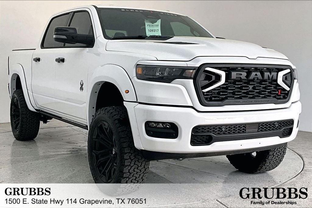 2026 RAM Ram 1500 RAM 1500 BIG HORN CREW CAB 4X4 5'7' BOX in Bright White Clear-Coat Exterior Paint — front three-quarter view