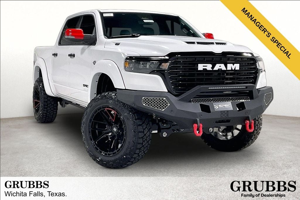 2026 RAM Ram 1500 RAM 1500 LARAMIE CREW CAB 4X4 5'7' BOX in Bright White Clear-Coat Exterior Paint — front three-quarter view