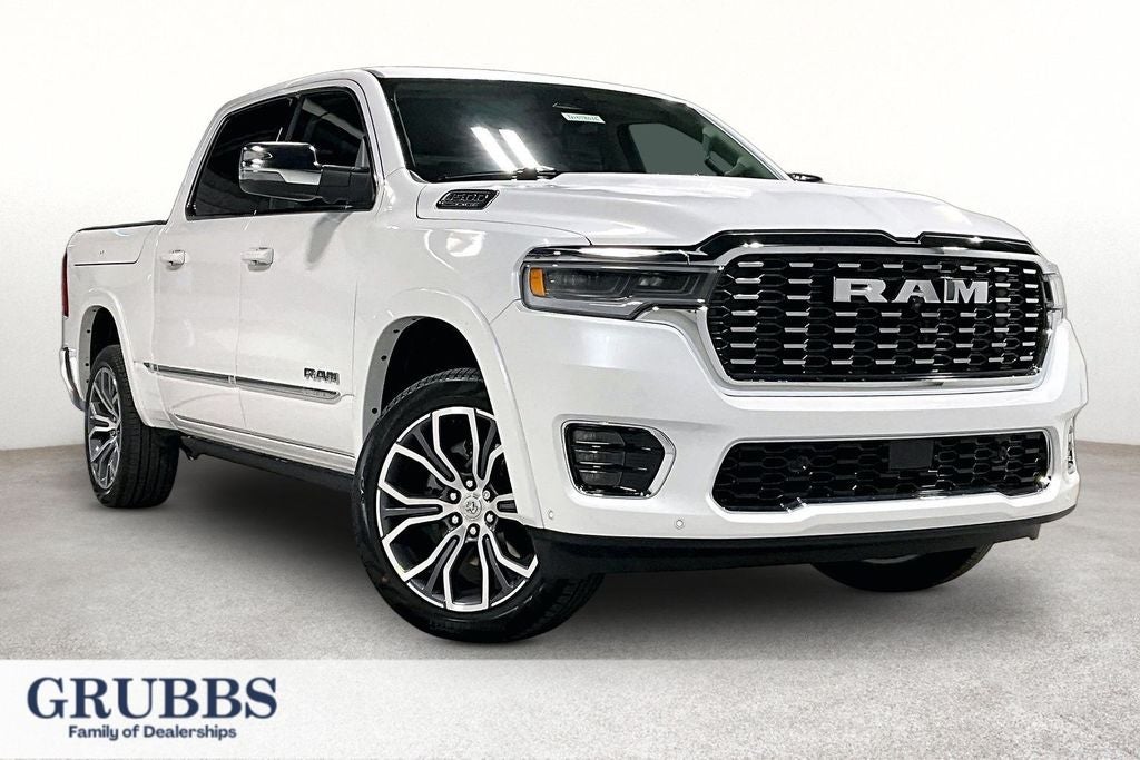 2026 RAM 1500 Tungsten in Ivory White Tri-Coat Pearlcoat — front three-quarter view