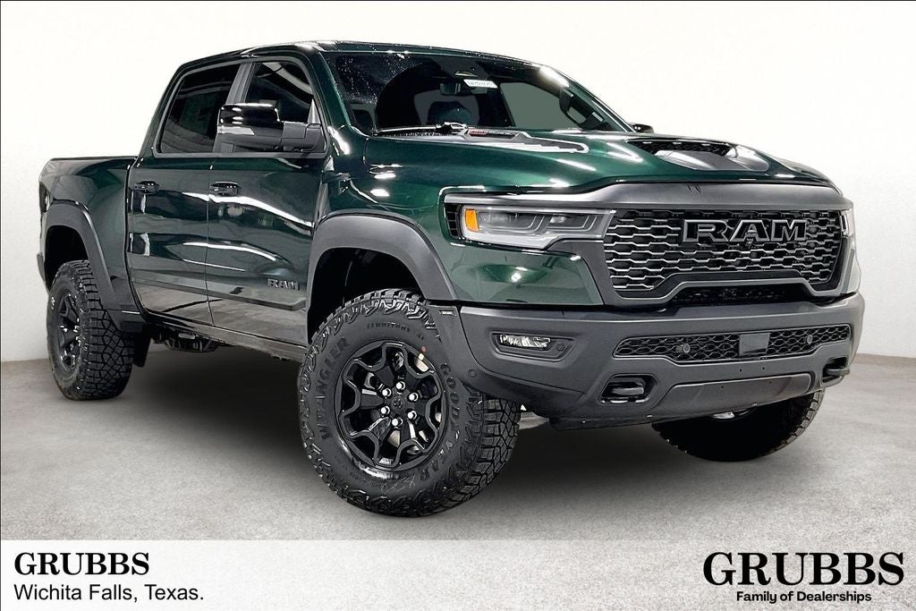 2026 RAM Ram 1500 RAM 1500 RHO CREW CAB 4X4 5'7' BOX in Serrano-Green Metallic Exterior Paint — front three-quarter view