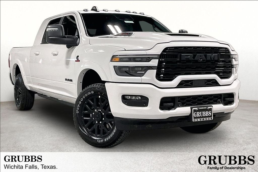 2026 RAM Ram 3500 RAM 3500 LIMITED MEGA CAB 4X4 6'4' BOX in Bright White Clear-Coat Exterior Paint — front three-quarter view