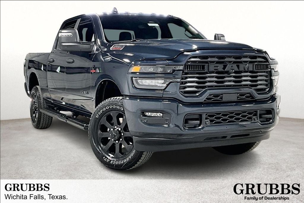 2026 RAM Ram 2500 RAM 2500 LONE STAR CREW CAB 4X4 6'4' BOX in Forged Blue Metallic Exterior Paint — front three-quarter view