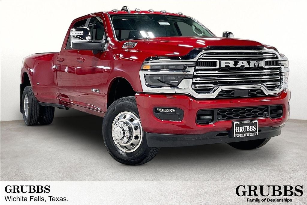 2026 RAM Ram 3500 RAM 3500 LARAMIE CREW CAB 4X4 8' BOX in Molten Red Pearl-Coat Exterior Paint — front three-quarter view