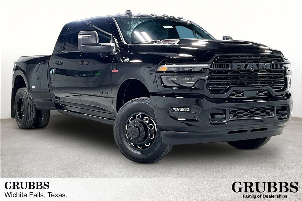 2026 RAM Ram 3500 RAM 3500 LARAMIE MEGA CAB 4X4 6'4' BOX in Diamond Black Crystal Pearl-Coat Exterior Paint — front three-quarter view