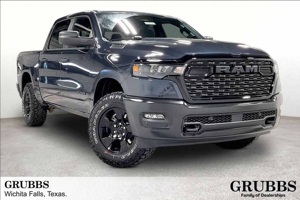 2026 RAM Ram 1500 RAM 1500 WARLOCK CREW CAB 4X4 5'7' BOX in Forged Blue Metallic Exterior Paint — front three-quarter view