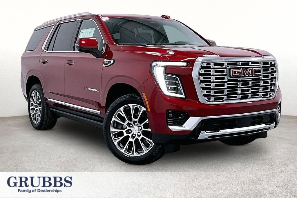 2026 GMC Yukon Denali in Volcanic Red Tintcoat — front three-quarter view