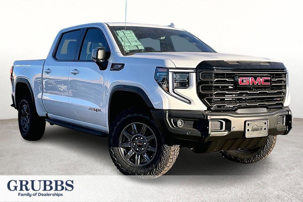 2026 GMC Sierra 1500 AT4X in Summit White — front three-quarter view